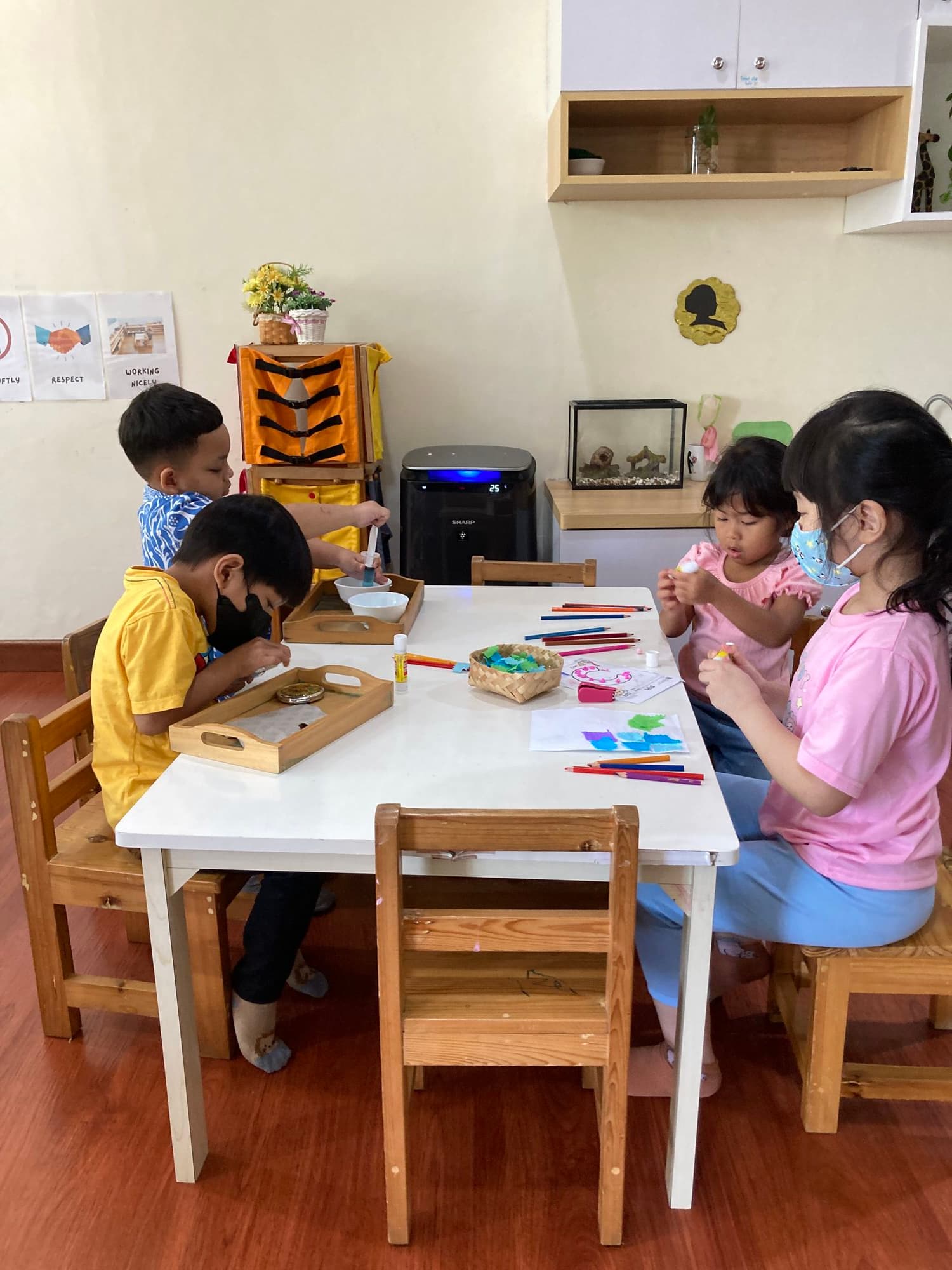 Children collaborating naturally on an activity together